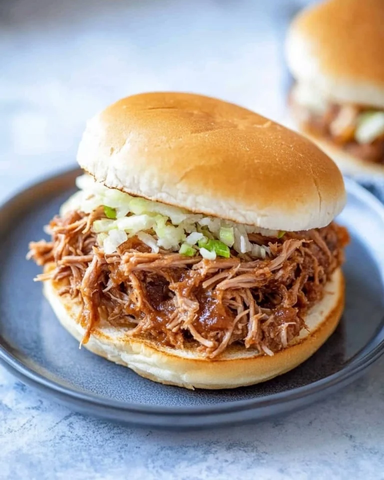 Slow-Cooker-Pulled-Pork-Tender-Shredded-Pork-Sandwiches-Recipe